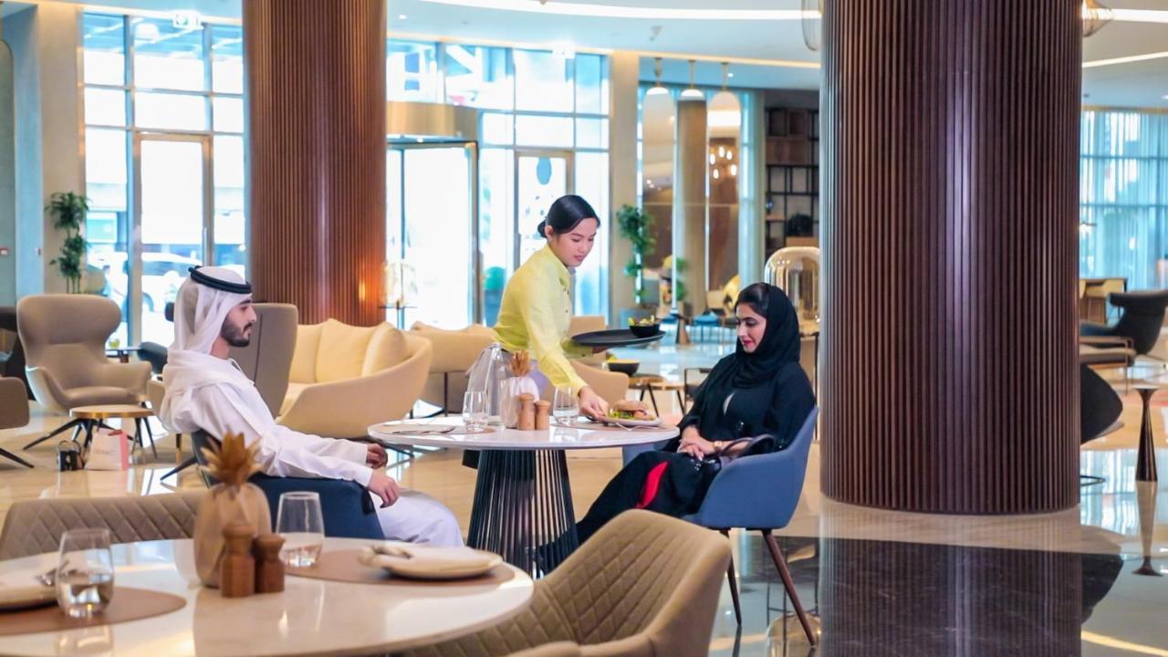 Pullman Sharjah Hotel Kültér fotó A hotel in the UAE