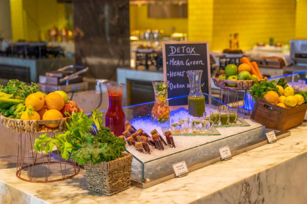 Pullman Sharjah Hotel Kültér fotó Healthy food at a buffet