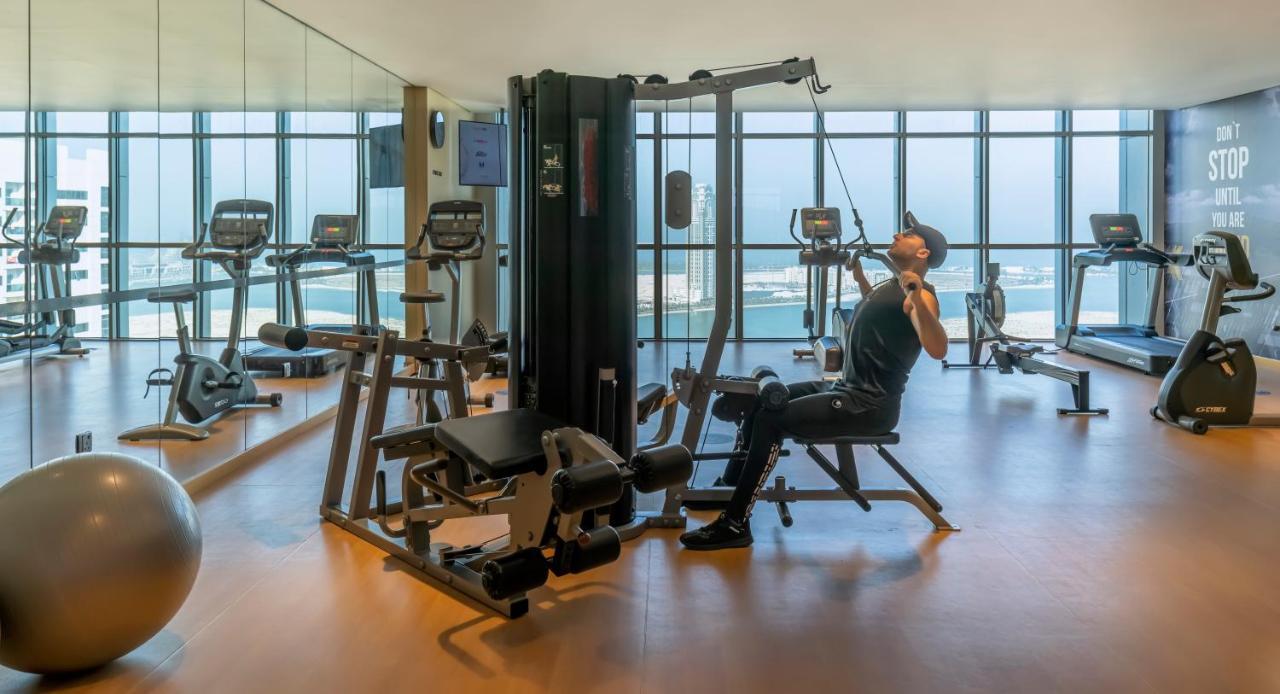 Pullman Sharjah Hotel Kültér fotó The gym at the hotel
